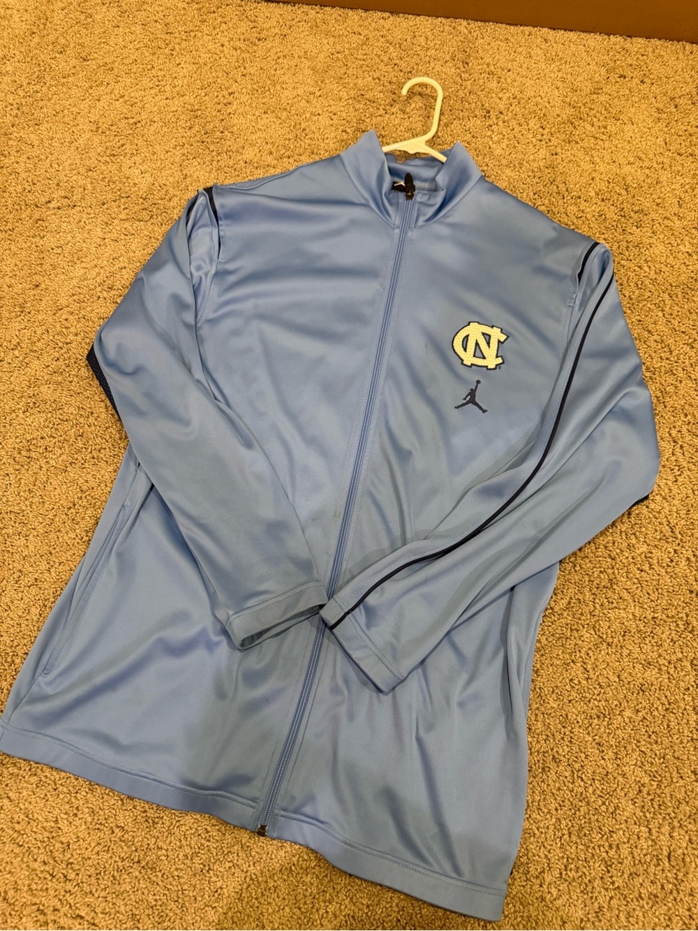 Jordan Men’s Light Blue UNC Track Jacket with Jumpman Logo